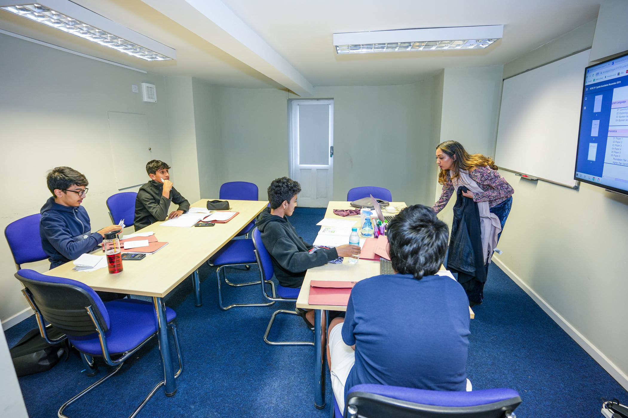 An image of private tuition in the classroom.
